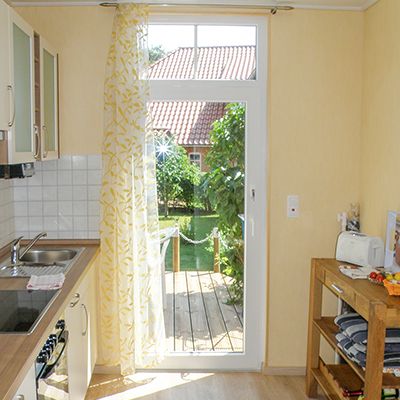 Küche und Zugang zum Garten